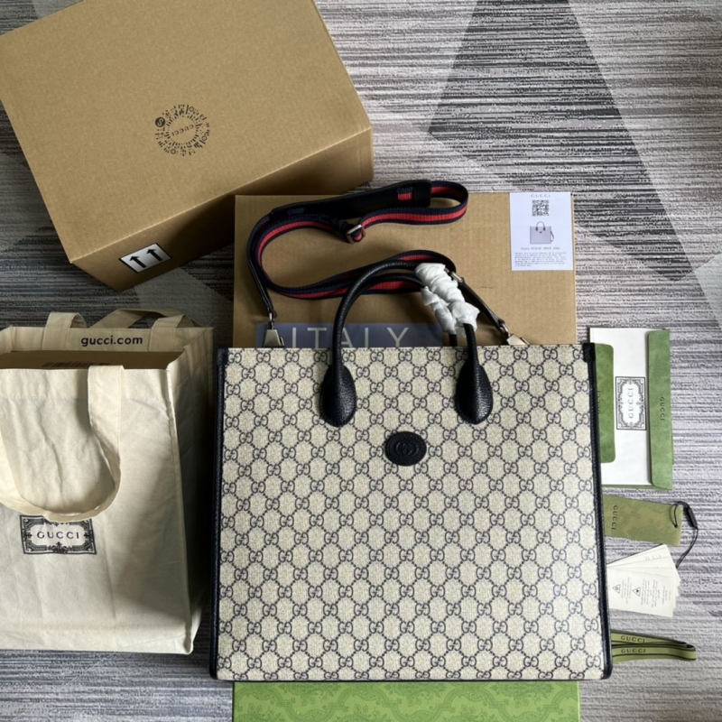 G*u*i shopping bags